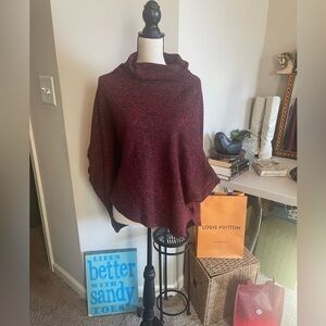 Woman’s Pancho Style sweater with arm holes fabric is heavy but soft